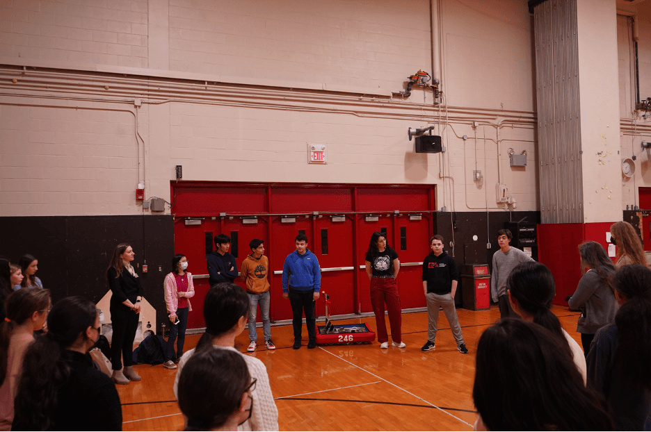 The team showing off the robot to eighth graders at the BUA Girl Power Admissions Event.