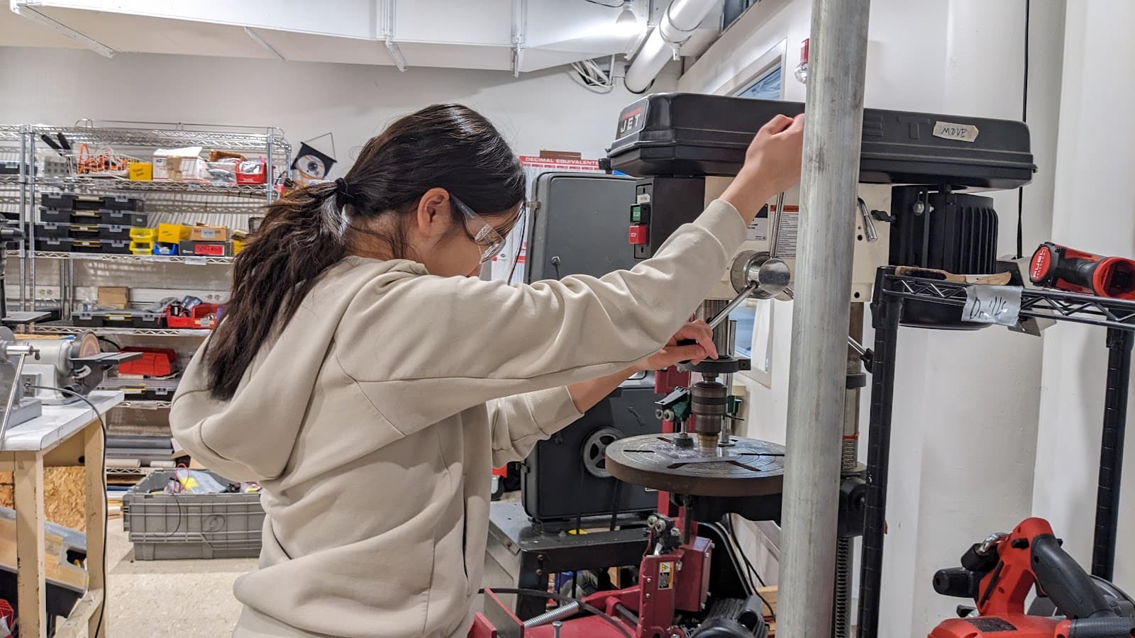 Coco Shen ’27 machining holes into a polycarbonate plate for our latest intake prototype.