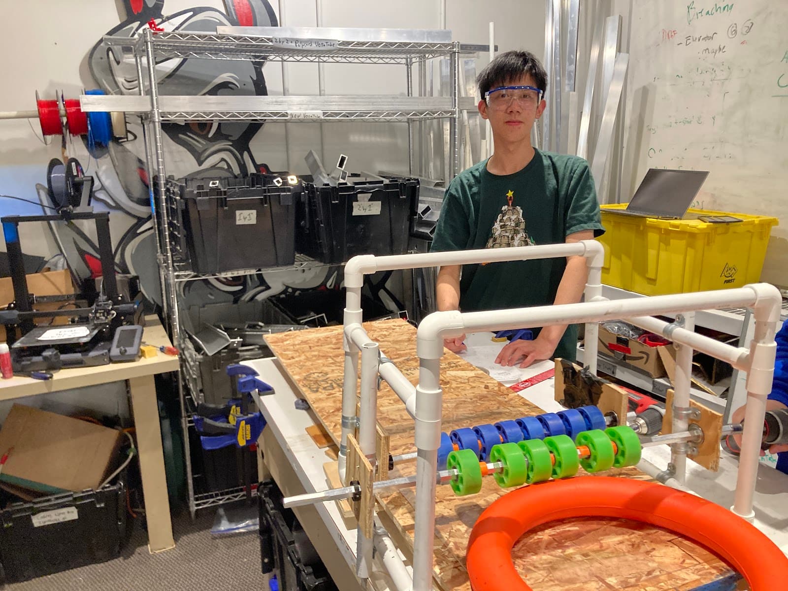 Maxwell Yu ‘25 records the positions of the rollers for the ground intake prototype.